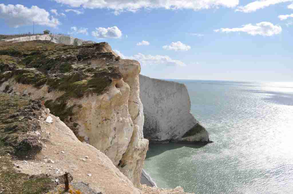 direct cremation in isle of wight - cliffs of isle of wight on a sunny day