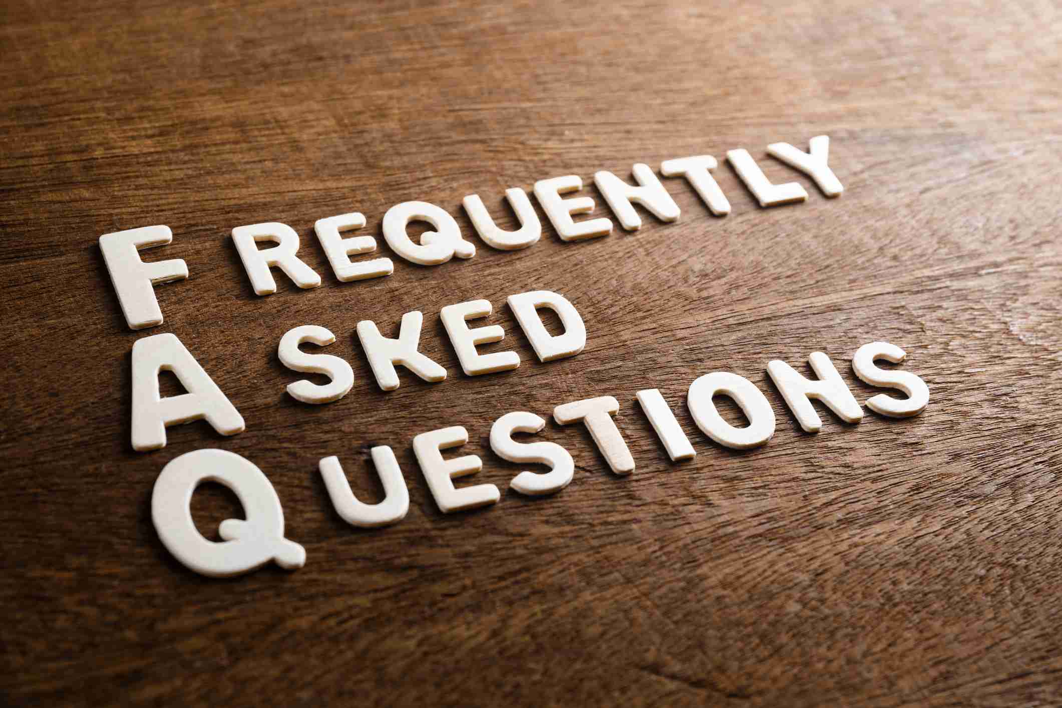 FAQs About Direct Cremation - Frequently answered questions written down on a table