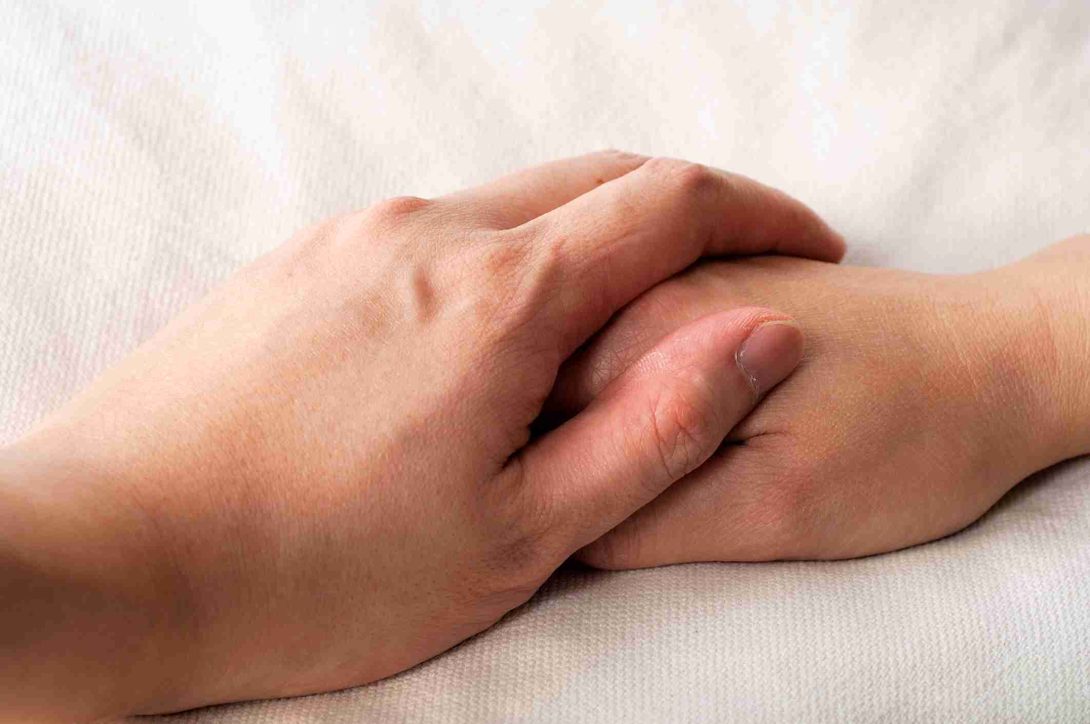What Happens When Someone Dies at home (2) - Holding hands in bed